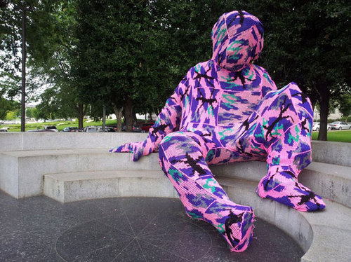 The artist Olek covered DC's Einstein statue in yarn.